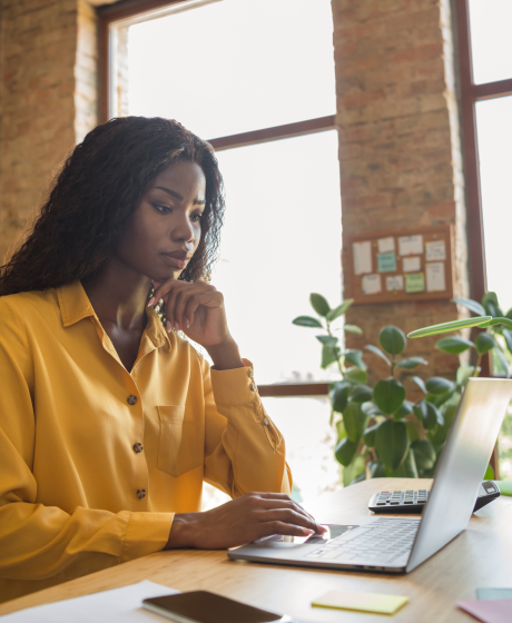 Bantwana woman working at an office desk