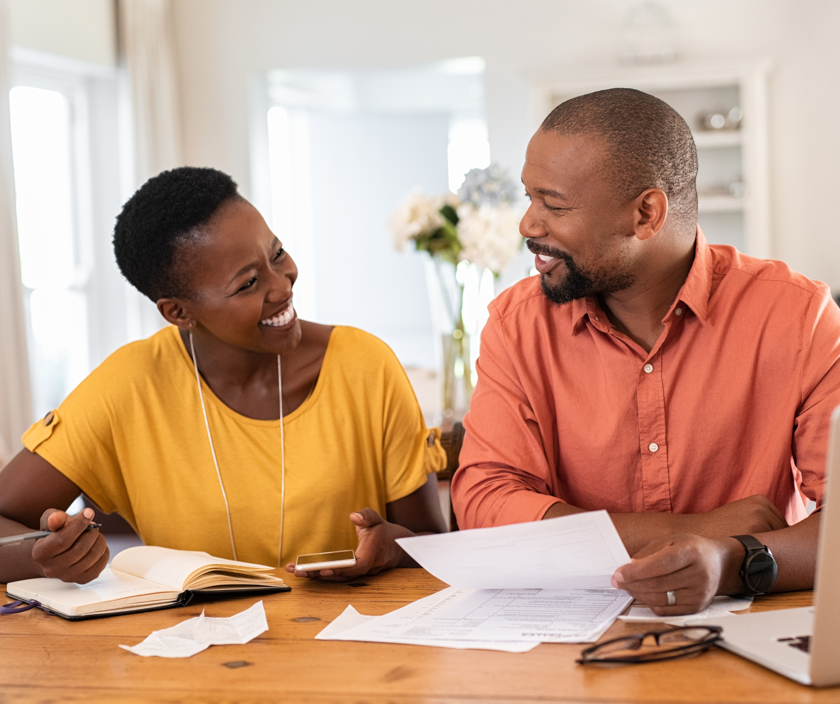 A Batswana couple going over documents.