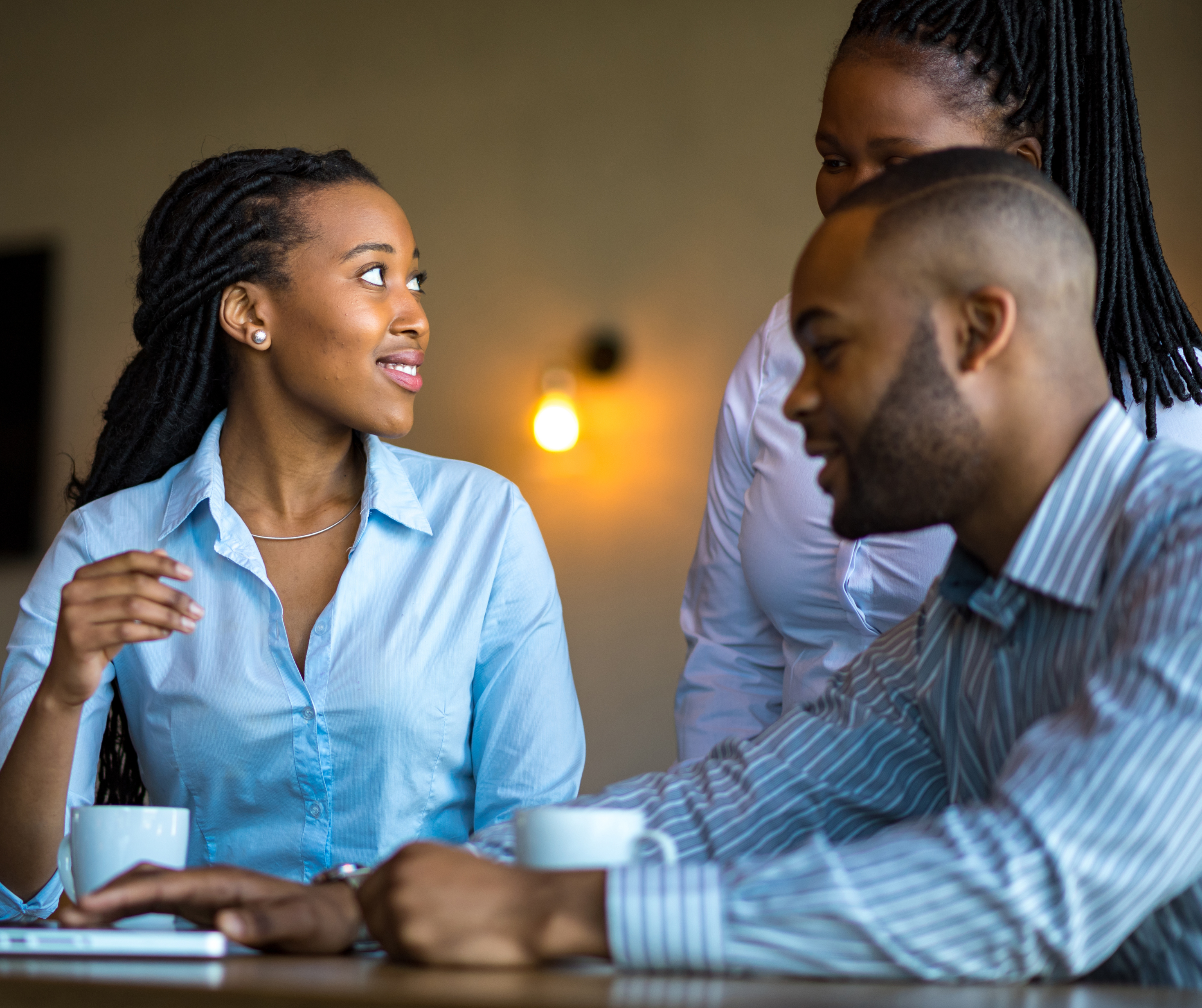Batswana colleagues discussing work matters.
