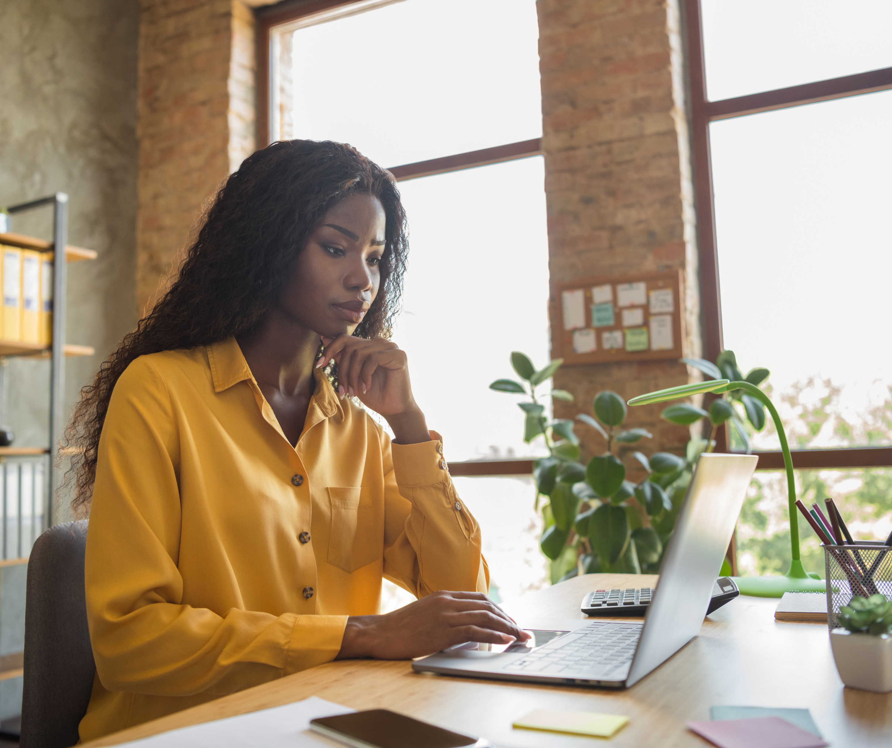 Bantwana woman working at an office desk