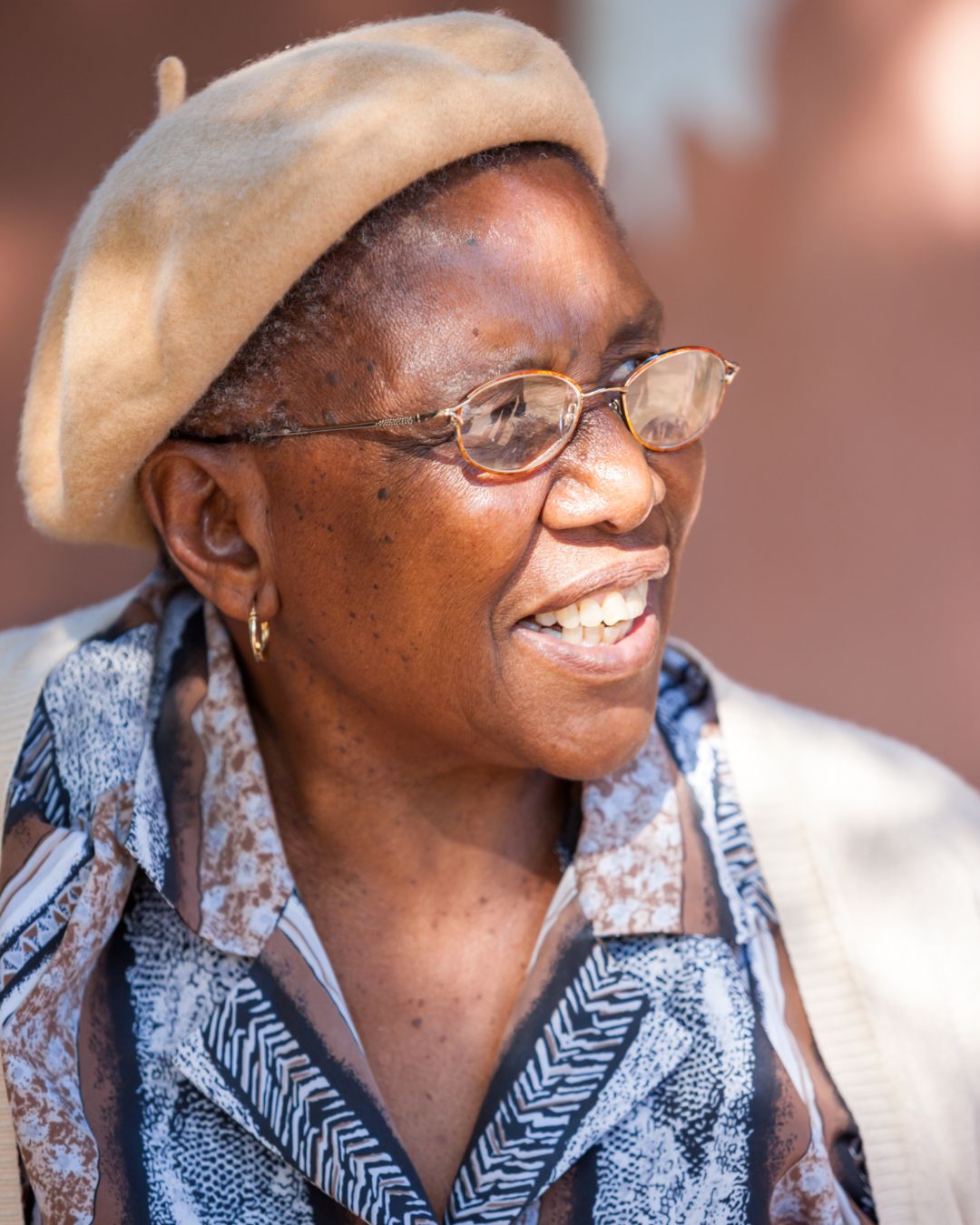 Elderly women smiling outside