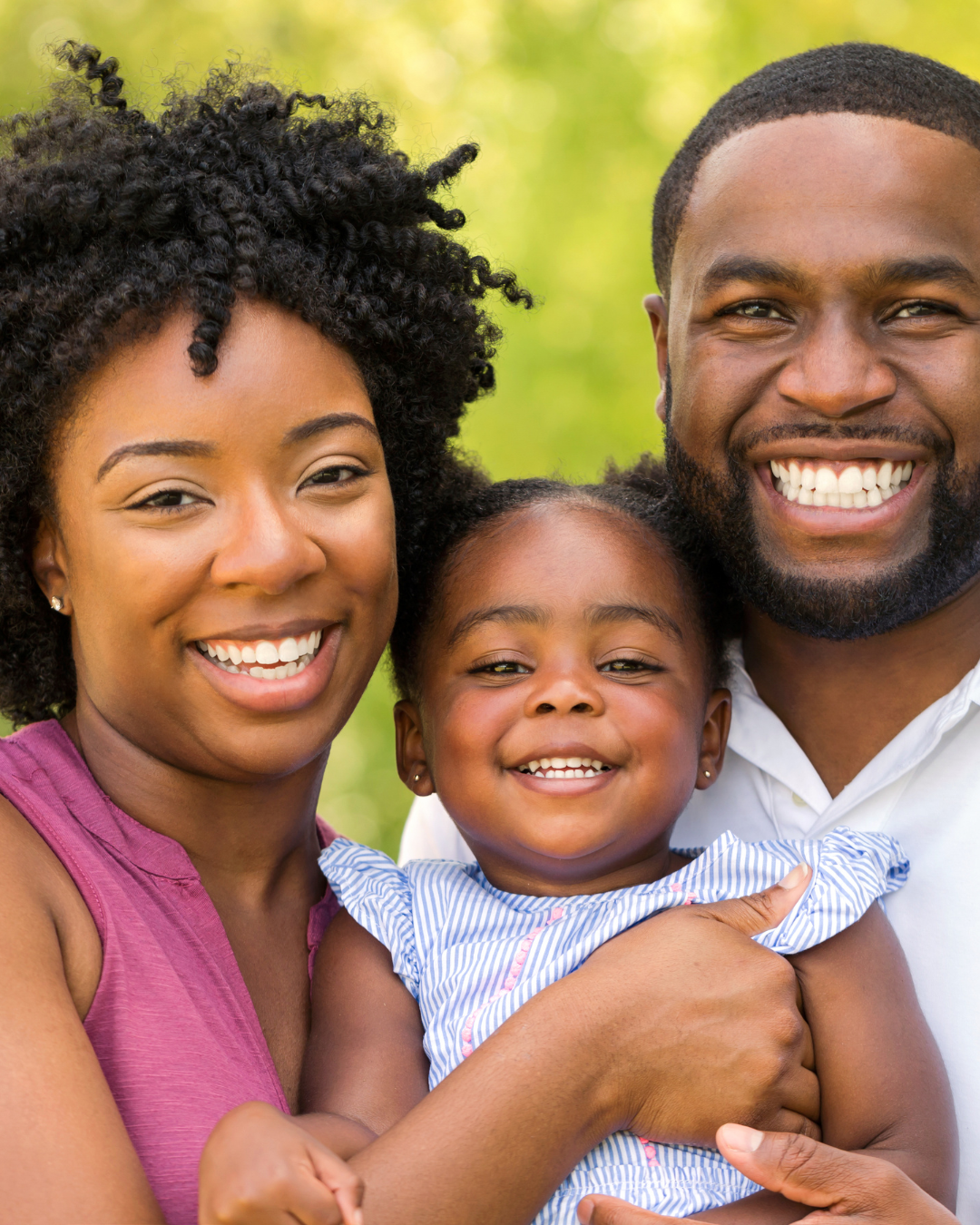 African family of 3, young baby, middle aged parents