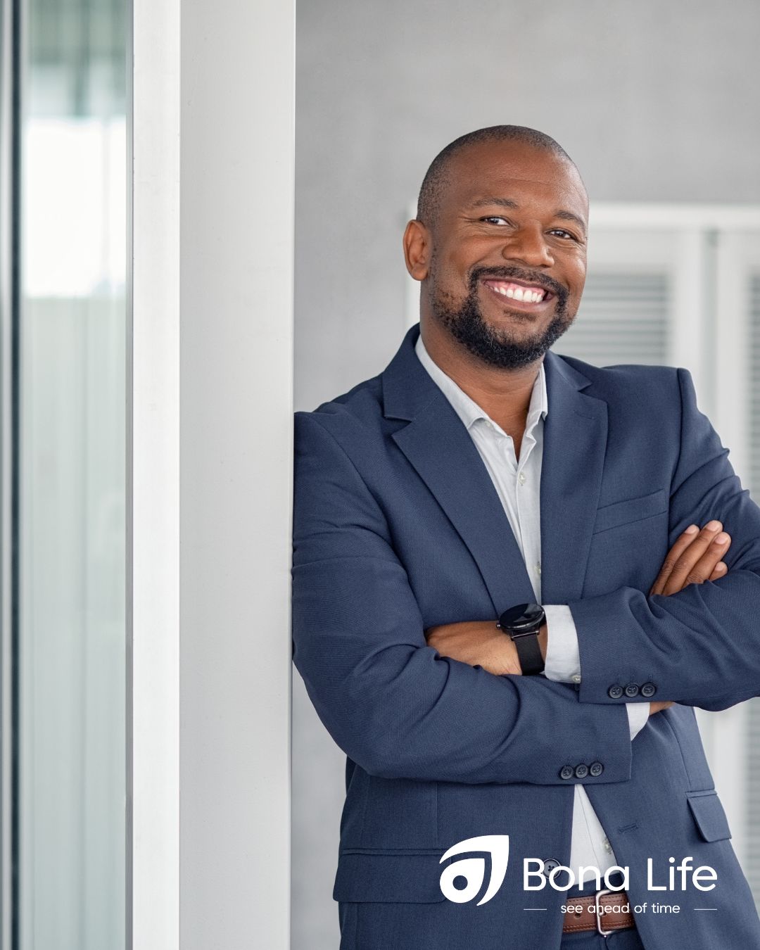 Business man happy with arms crossed and standing