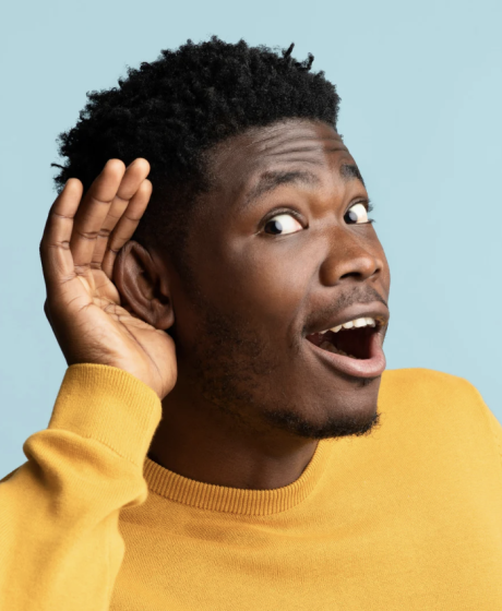 Young Batswana man listening for answers.