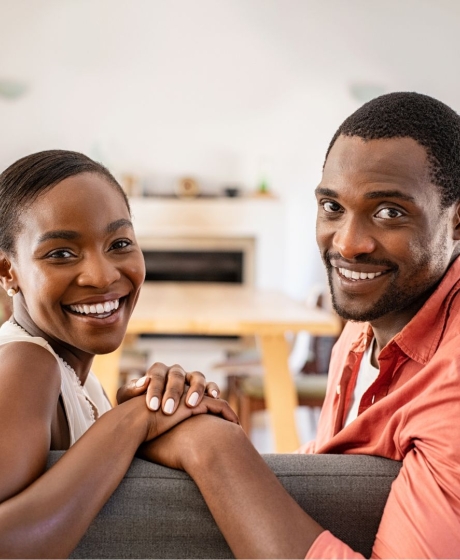 Young married couple hanging out in lounge